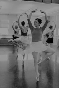 Ballerinas dancing in practice studio